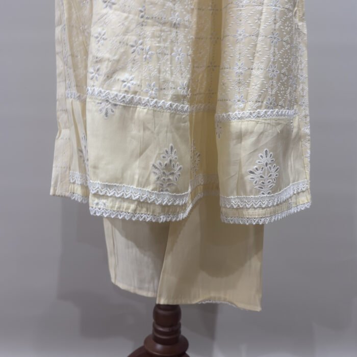 Chikankari embroidery detail on cream Anarkali kurta